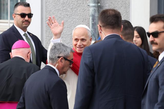 Pope Leo XIV arrives at the Cathedral of the Holy Spirit (St Esprit cathedral) for a meeting with bishops, priests, deacons, consecrated men and women, and pastoral workers , in Istanbul on November 28, 2025. (Photo by BERK OZKAN / AFP)