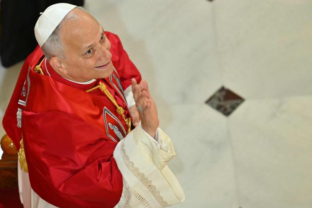 Pope Leo XIV waves as he arrives at the Cathedral of the Holy Spirit (St Esprit cathedral) for a meeting with bishops, priests, deacons, consecrated men and women, and pastoral workers , in Istanbul on November 28, 2025. (Photo by Andreas SOLARO / AFP)