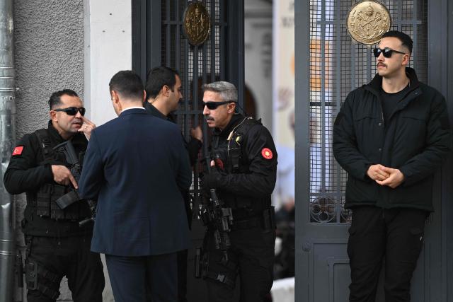 Members of the security  are pictured outside the Cathedral of the Holy Spirit (St Esprit cathedral) where Pope Leo XIV attends a meeting with bishops, priests, deacons, consecrated men and women, and pastoral workers , in Istanbul on November 28, 2025. (Photo by YASIN AKGUL / AFP)