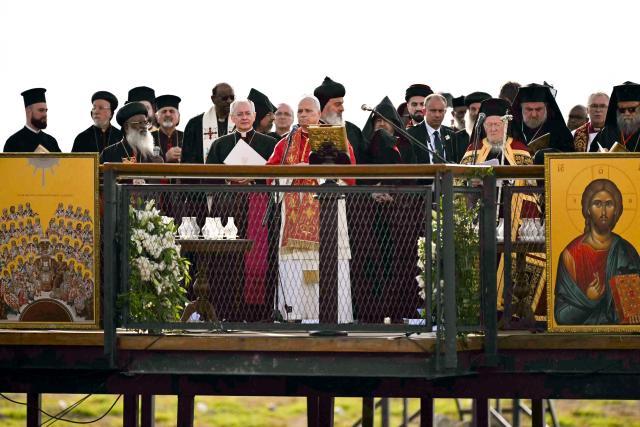 Pope Leo XIV and Patriarch Bartholomew I of Constantinople attend an ecumenical prayer service near the sunken Byzantine Basilica of Saint Neophytos by Lake Iznik, on November 28, 2025. Pope Leo XIV is on a four-day visit to Turkey. (Photo by Ozan KOSE / AFP)