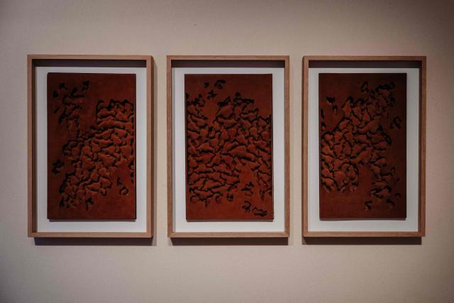 This photograph taken on November 28, 2025 in Paris shows a chocolate pastry made by France's pastry chef Yann Couvreur displayed three days ahead of an auction of 25 grands chefs pastries for the benefit of the BAB Charity association, which works for the well-being and development of children with leukaemia who are hospitalised at the Armand Trousseau Hospital in Paris.

"25 pastry chefs commit to helping children", at Artcurial auction house in Paris. (Photo by Dimitar DILKOFF / AFP)