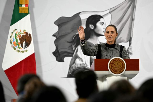 Mexico's President Claudia Sheinbaum speaks during her daily press conference at Palacio Nacional in Mexico City on November 28, 2025. Mexico's attorney general resigned on November 27 after President Claudia Sheinbaum offered him an ambassadorship, according to a letter read out in the Senate. (Photo by Yuri CORTEZ / AFP)
