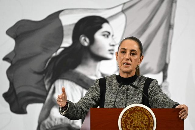 Mexico's President Claudia Sheinbaum speaks during her daily press conference at Palacio Nacional in Mexico City on November 28, 2025. Mexico's attorney general resigned on November 27 after President Claudia Sheinbaum offered him an ambassadorship, according to a letter read out in the Senate. (Photo by Yuri CORTEZ / AFP)