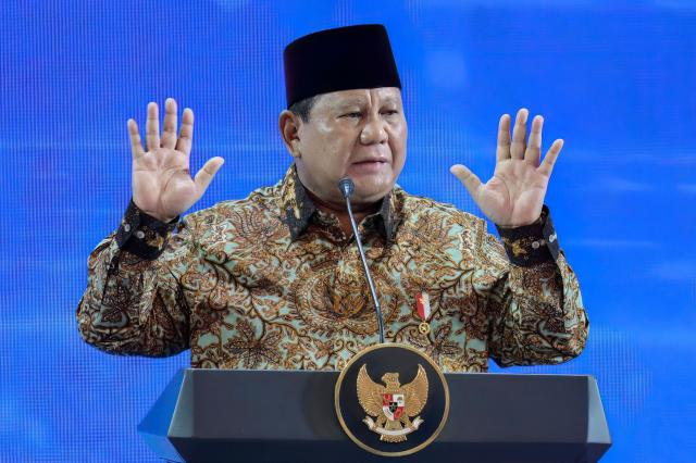 Indonesian President Prabowo Subianto speaks during an annual meeting of Bank Indonesia (Indonesia's Central Bank) in Jakarta on November 28, 2025. (Photo by BAY ISMOYO / AFP)