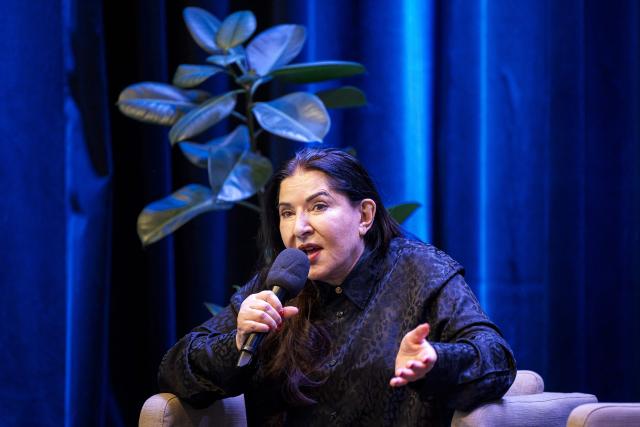 Serbian conceptual artist Marina Abramovic speaks during a press conference prior to the inauguration of the Art Vital exhibition of the couple, Ulay/Marina Abramovic at the Ljubljana Modern Arts Museum Cukrarna in Ljubljana, Slovenia on November 28, 2025. (Photo by Jure Makovec / AFP)