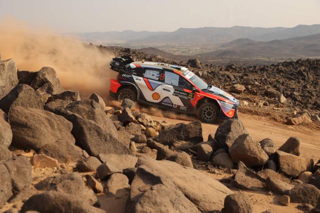 Hyundai Shell Mobis World Rally Team's Estonian driver Ott Tanak and Estonian co-driver Martin Jarveoja steer their Hyundai i20 N Rally1 during the third stage of FIA World Rally Championship (WRC) in Jeddah on November 28, 2025. (Photo by Fayez Nureldine / AFP)