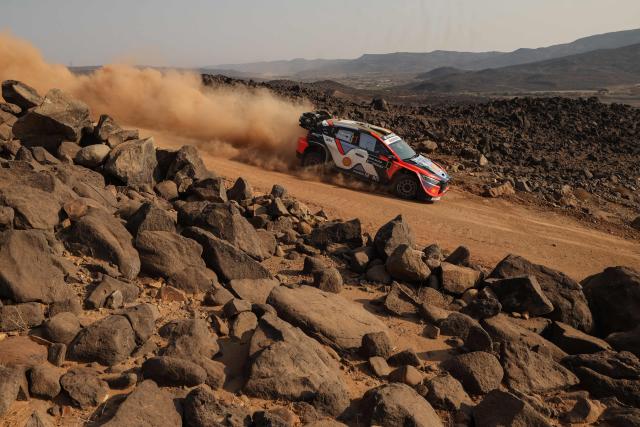 Hyundai Shell Mobis World Rally Team's Belgian driver Thierry Neuville and Belgian co-driver Martijn Wydaeghe steer their Hyundai i20 N Rally1 during the third stage of FIA World Rally Championship (WRC) in Jeddah on November 28, 2025. (Photo by Fayez Nureldine / AFP)