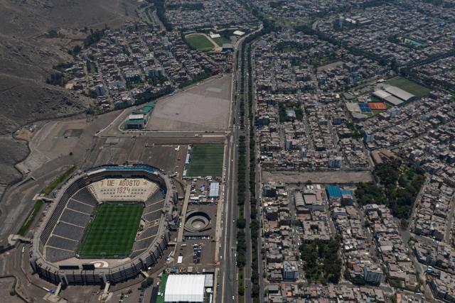 TOPSHOT - Aerial view of the Monumental Stadium ahead the final of the 2025 Copa Conmebol Libertadores between Palmeiras and Flamengo in Lima, taken on November 28, 2025. (Photo by Ernesto BENAVIDES / AFP)