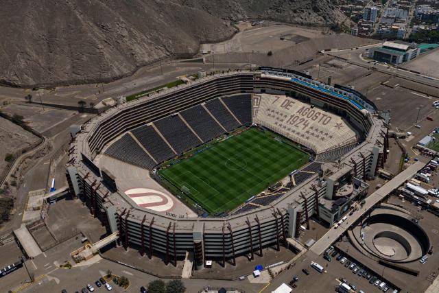 Aerial view of the Monumental Stadium ahead the final of the 2025 Copa Conmebol Libertadores between Palmeiras and Flamengo in Lima, taken on November 28, 2025. (Photo by Ernesto BENAVIDES / AFP)