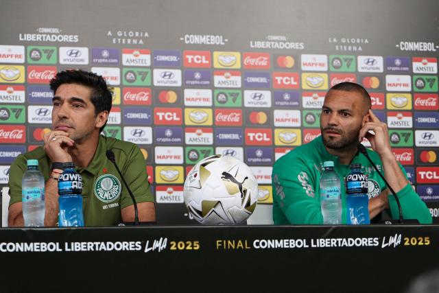 Palmeiras' Portuguese coach Abel Ferreira (L) and goalkeeper Weverton give a press conference on the eve of the all Brazilian Copa Libertadores final football match between Palmeiras and Flamengo in Lima on November 28, 2025. (Photo by WILLY ESCURRA / AFP)