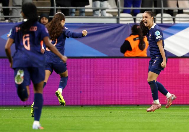 France's defender #07 Sakina Karchaoui (R) celebtrates France's second goal during the Women's Nations League third place playoff first leg football match between France and Sweden at Auguste-Delaune stadium in Reims, on November 28, 2025. (Photo by FRANCK FIFE / AFP)