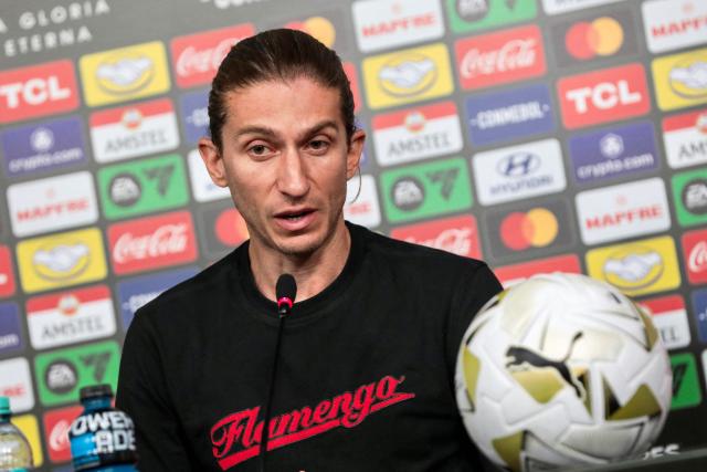 Flamengo's head coach Filipe Luis speaks during a press conference on the eve of the all Brazilian Copa Libertadores final football match between Palmeiras and Flamengo in Lima on November 28, 2025. (Photo by Connie FRANCE / AFP)