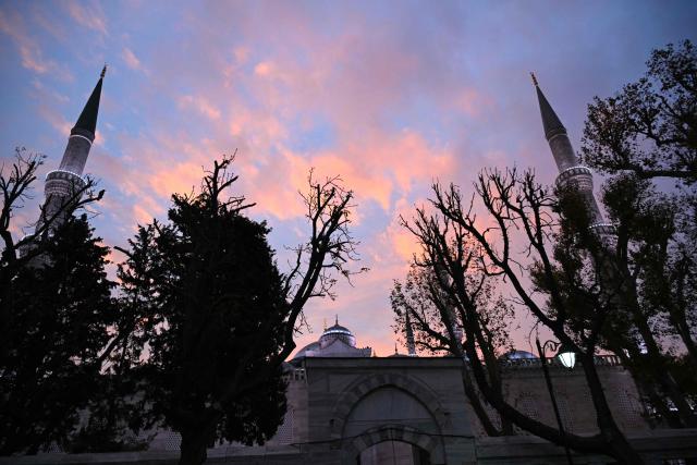 A picture shows the Sultan Ahmed Mosche (Blue Mosche) at sunrise before a visit of Pope Leo XIV, in Istanbul on November 29, 2025. (Photo by Andreas SOLARO / AFP)