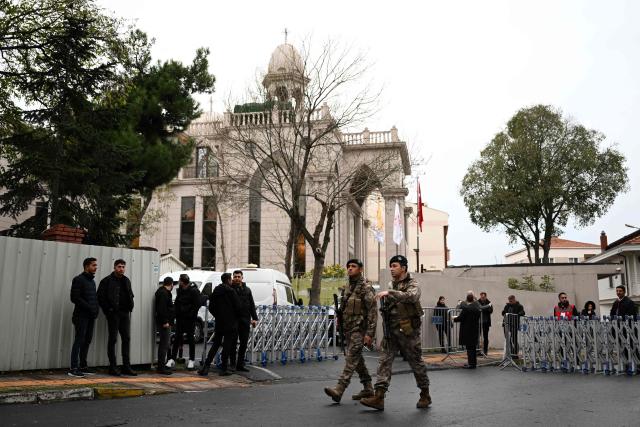 Security members patrol prior the arrival of Pope Leo XIV for a private meeting with religious leaders at the Mor Ephrem Syriac Orthodox Church, in Istanbul on November 29, 2025. (Photo by YASIN AKGUL / AFP)