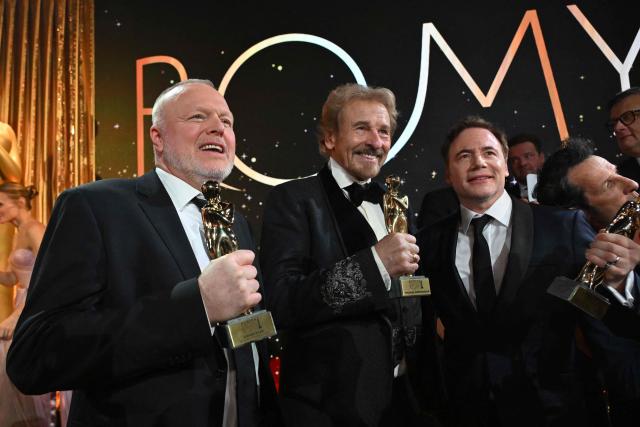 German host and entertainer Stefan Raab (L), German host and entertainer Thomas Gottschalk (C) and German comedian and actor Michael Herbig pose with their trophies during the award ceremony of the Kurier Romy Gala in Kitzbühel, Austria on November 28, 2025. (Photo by BARBARA GINDL / APA / AFP) / Austria OUT