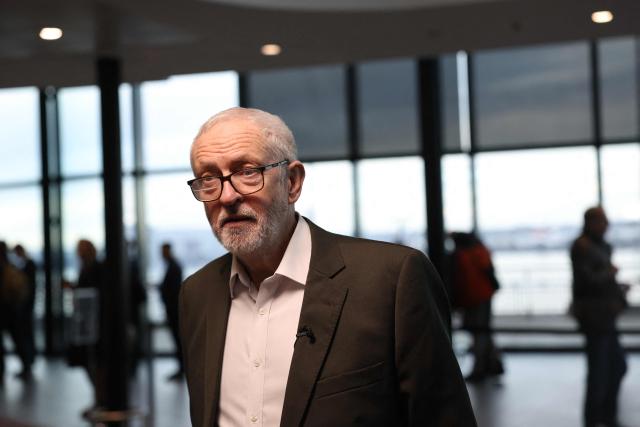 TOPSHOT - Former Labour Party leader and co-founder of "Your Party", Jeremy Corbyn arrives at the venue on the first day of the Founding Conference for Your Party in Liverpool, north-west England, on November 29, 2025. A new UK political party involving veteran socialist Jeremy Corbyn opens its inaugural conference Saturday, seeking to move on from a messy launch and become a viable left-wing challenger to Labour. (Photo by Darren Staples / AFP)