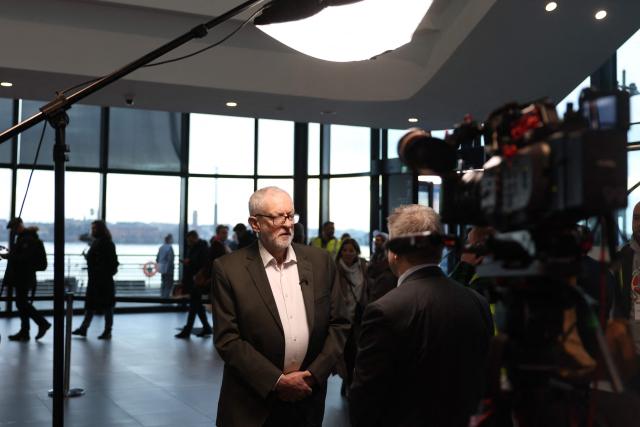 Former Labour Party leader and co-founder of "Your Party", Jeremy Corbyn speaks to members of the media as he arrives at the venue on the first day of the Founding Conference for Your Party in Liverpool, north-west England, on November 29, 2025. A new UK political party involving veteran socialist Jeremy Corbyn opens its inaugural conference Saturday, seeking to move on from a messy launch and become a viable left-wing challenger to Labour. (Photo by Darren Staples / AFP)