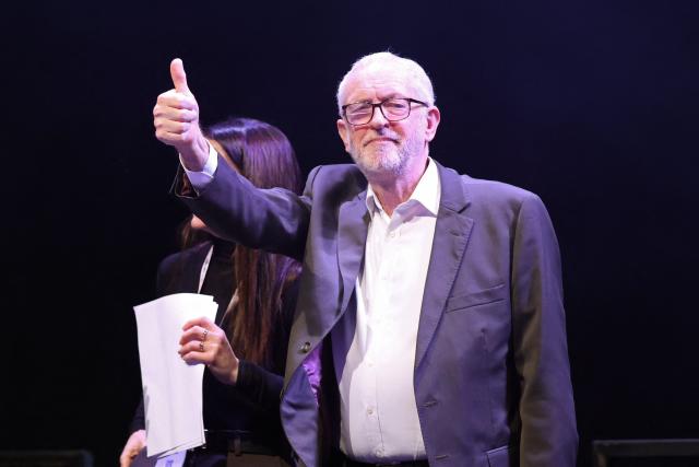 Former Labour Party leader and co-founder of "Your Party", Jeremy Corbyn reacts after delivering a speech on the first day of the Founding Conference for Your Party in Liverpool, north-west England, on November 29, 2025. A new UK political party involving veteran socialist Jeremy Corbyn opens its inaugural conference Saturday, seeking to move on from a messy launch and become a viable left-wing challenger to Labour. (Photo by Darren Staples / AFP)