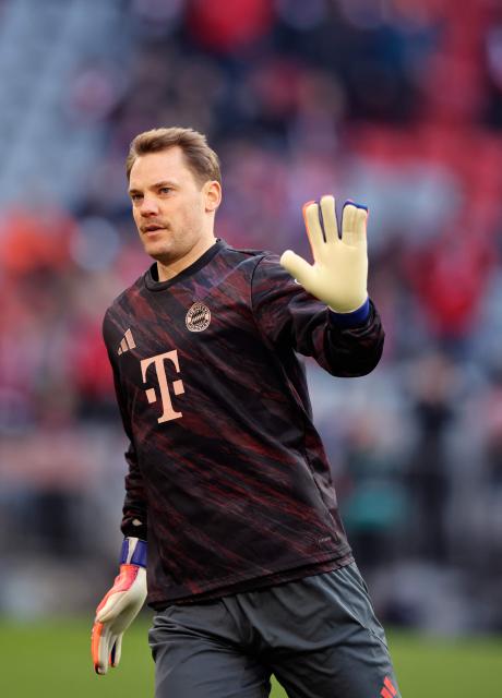 Bayern Munich's German goalkeeper #01 Manuel Neuer cheers to supporters before the German first division Bundesliga football match between FC Bayern Munich and FC St Pauli in Munich, southern Germany on November 29, 2025. (Photo by Alexandra BEIER / AFP) / DFL REGULATIONS PROHIBIT ANY USE OF PHOTOGRAPHS AS IMAGE SEQUENCES AND/OR QUASI-VIDEO