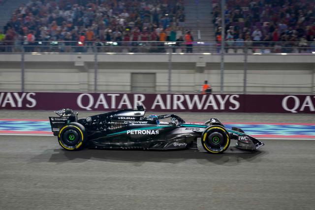 Mercedes' British driver George Russell drives during the sprint race ahead of the Formula One Qatar Grand Prix at the Lusail International Circuit in Lusail on November 29, 2025. (Photo by Altaf Qadri / POOL / AFP)