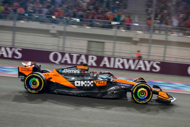 TOPSHOT - McLaren's Australian driver Oscar Piastri drives during the sprint race ahead of the Formula One Qatar Grand Prix at the Lusail International Circuit in Lusail on November 29, 2025. (Photo by Altaf Qadri / POOL / AFP)