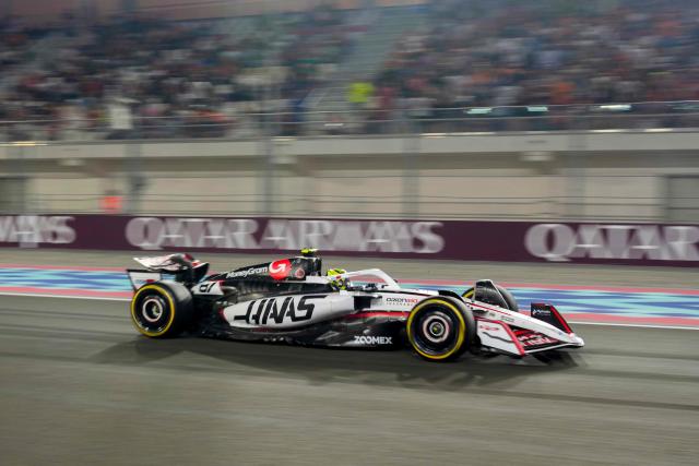 TOPSHOT - Haas F1 Team's British driver Oliver Bearman drives during the sprint race ahead of the Formula One Qatar Grand Prix at the Lusail International Circuit in Lusail on November 29, 2025. (Photo by Altaf Qadri / POOL / AFP)