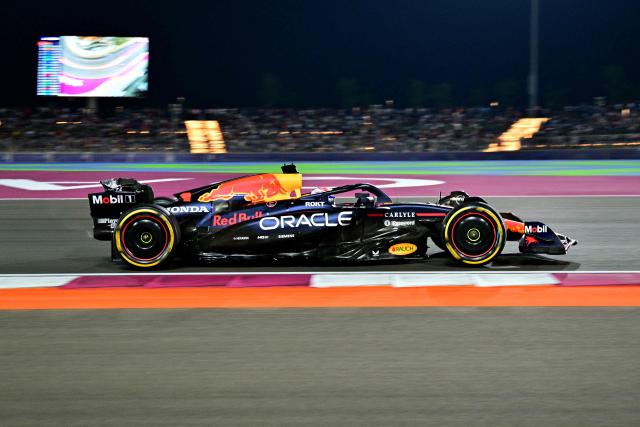 Red Bull Racing's Dutch driver Max Verstappen drives during the sprint race ahead of the Formula One Qatar Grand Prix at the Lusail International Circuit in Lusail on November 29, 2025. (Photo by Andrej ISAKOVIC / AFP)