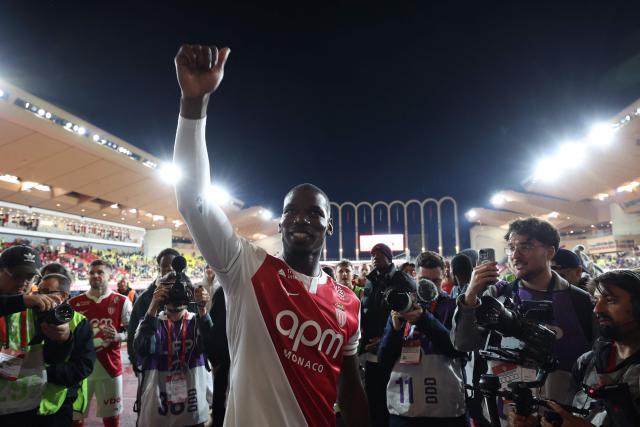 Monaco's French midfielder #08 Paul Pogba gestures to supporters at the end of the French L1 football match between AS Monaco and Paris Saint-Germain (PSG) at the Stade Louis II in the Principality of Monaco on November 29, 2025. (Photo by Valery HACHE / AFP)