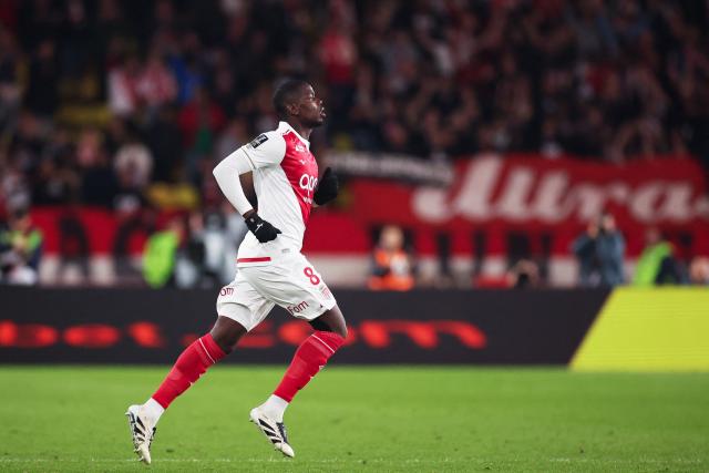 Monaco's French midfielder #08 Paul Pogba enters the field during the French L1 football match between AS Monaco and Paris Saint-Germain (PSG) at the Stade Louis II in the Principality of Monaco on November 29, 2025. (Photo by Valery HACHE / AFP)