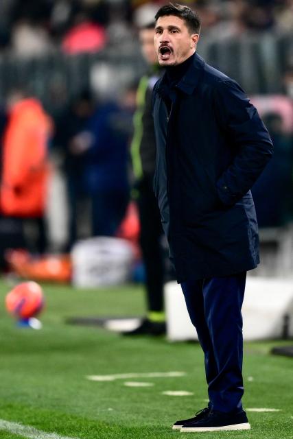 Cagliari's Italian coach Fabio Pisacane reacts during the Italian Serie A football match between Juventus and Cagliari at the Allianz Stadium, in Turin, northern Italy on November 29, 2025. (Photo by MARCO BERTORELLO / AFP)