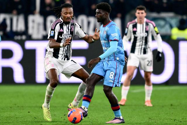 Cagliari's French midfielder #08 Michel Ndary Adopo (R) fights for the ball with Juventus' French midfielder #19 Khephren Thuram-Ulien during the Italian Serie A football match between Juventus and Cagliari at the Allianz Stadium, in Turin, northern Italy on November 29, 2025. (Photo by MARCO BERTORELLO / AFP)