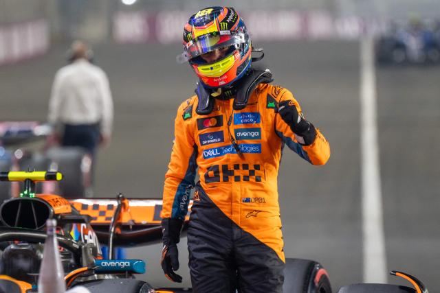 McLaren's Australian driver Oscar Piastri celebrates after securing pole position at the end of the qualifying session ahead of the Formula One Qatar Grand Prix at the Lusail International Circuit in Lusail on November 29, 2025. (Photo by Andrej ISAKOVIC / AFP)