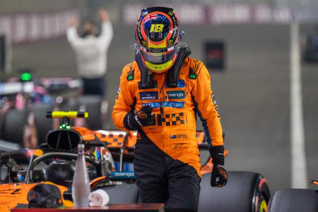 McLaren's Australian driver Oscar Piastri celebrates after securing pole position at the end of the qualifying session ahead of the Formula One Qatar Grand Prix at the Lusail International Circuit in Lusail on November 29, 2025. (Photo by Andrej ISAKOVIC / AFP)