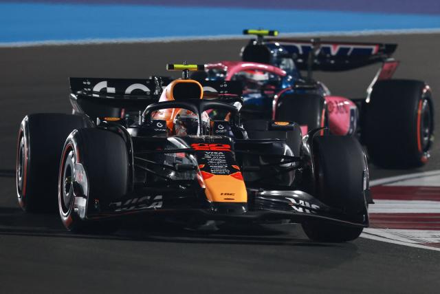 Red Bull Racing's Japanese driver Yuki Tsunoda drives during the qualifying session ahead of the Formula One Qatar Grand Prix at the Lusail International Circuit in Lusail on November 29, 2025. (Photo by Karim JAAFAR / AFP)