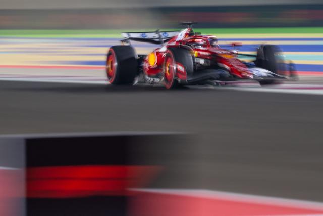 Ferrari's Monegasque driver Charles Leclerc drives during the qualifying session ahead of the Formula One Qatar Grand Prix at the Lusail International Circuit in Lusail on November 29, 2025. (Photo by Andrej ISAKOVIC / AFP)