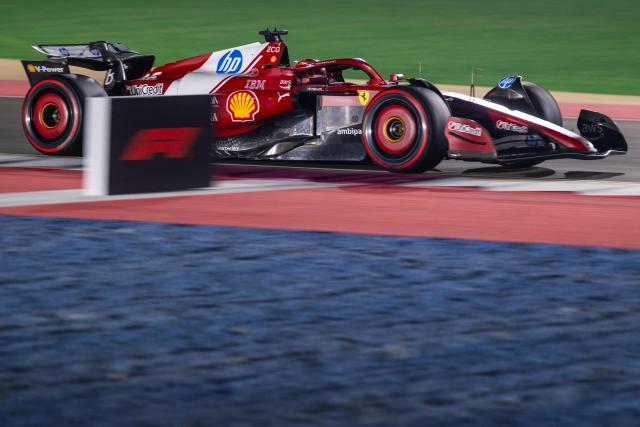 Ferrari's Monegasque driver Charles Leclerc drives during the qualifying session ahead of the Formula One Qatar Grand Prix at the Lusail International Circuit in Lusail on November 29, 2025. (Photo by Andrej ISAKOVIC / AFP)