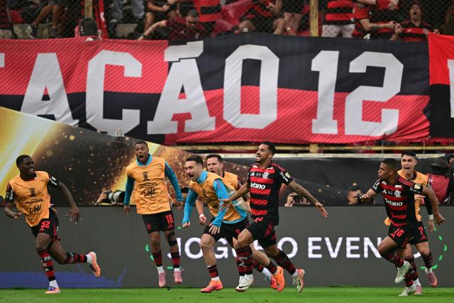 Flamengo's defender #13 Danilo (C) celebrates scoring his team's first goal during the all Brazilian Copa Libertadores final football match between Palmeiras and Flamengo at Monumental 'U' Marathon stadium in Lima on November 29, 2025. (Photo by ERNESTO BENAVIDES / AFP)