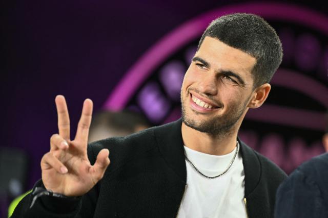 Professional tennis player Spaniard Carlos Alcaraz attends the Major League Soccer (MLS) Eastern Conference final football match between Inter Miami and New York City FC at Chase Stadium in Fort Lauderdale, Florida on November 29, 2025. (Photo by Chandan Khanna / AFP)
