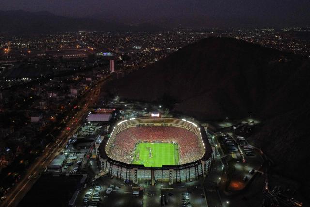 This aerial view shows the Monumental 'U' Marathon stadium in Lima on November 29, 2025 at the end of the all Brazilian Copa Libertadores final football match between Palmeiras and Flamengo. (Photo by Renato PAJUELO / AFP)