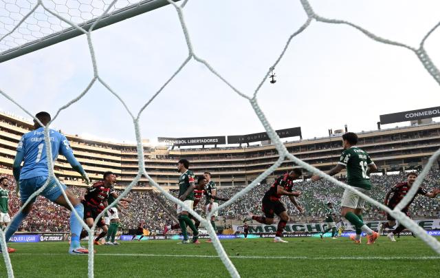 Flamengo's defender #13 Danilo (3rd R) celebrates scoring his team's first goal during the all Brazilian Copa Libertadores final football match between Palmeiras and Flamengo at Monumental 'U' Marathon stadium in Lima on November 29, 2025. (Photo by LUIS ACOSTA / AFP)