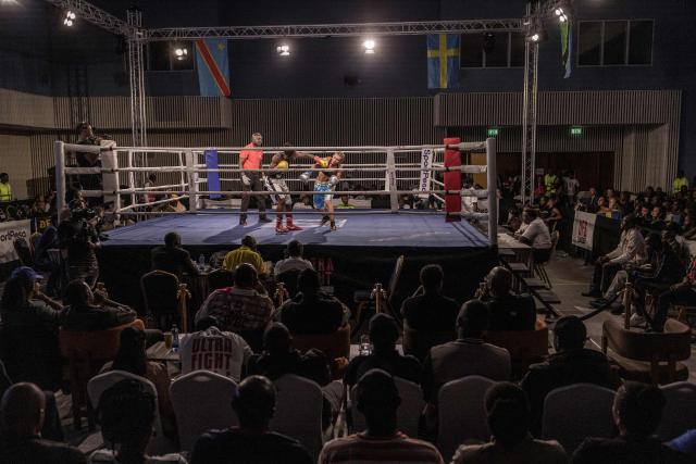 Sweden's Sandra Attermo (R) fights against Kenya's Consolata Musangi during their Women Super Bantamweight boxing title bout at the Edge Convention Centre, in Nairobi on November 29, 2025. (Photo by SIMON MAINA / AFP)