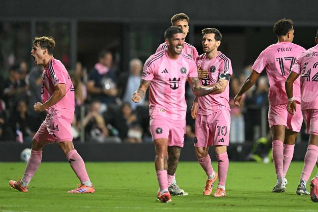 Inter Miami's Argentine forward #24 Mateo Silvetti (L) celebrates scoring his team's third goal alongside Inter Miami's Argentine forward #10 Lionel Messi (R) during the Major League Soccer (MLS) Eastern Conference final football match between Inter Miami and New York City FC at Chase Stadium in Fort Lauderdale, Florida on November 29, 2025. (Photo by CHANDAN KHANNA / AFP)