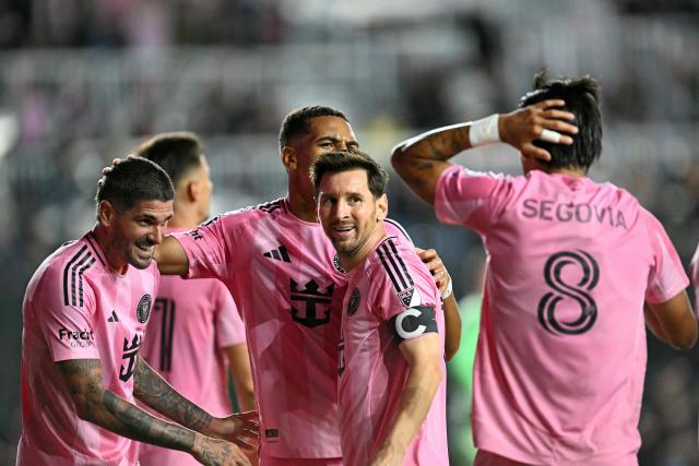 Inter Miami's Venezuelan midfielder #08 Telasco Segovia celebrates scoring his team's fourth goal with Inter Miami's Argentine forward #10 Lionel Messi (C) during the Major League Soccer (MLS) Eastern Conference final football match between Inter Miami and New York City FC at Chase Stadium in Fort Lauderdale, Florida on November 29, 2025. (Photo by CHANDAN KHANNA / AFP)