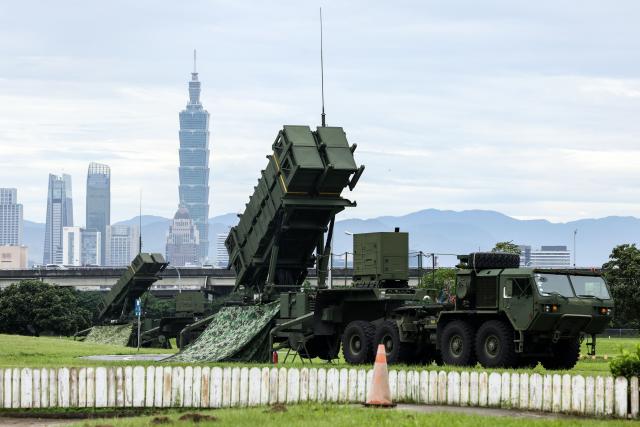 (FILES) An Air Force Patriot missile system is deployed at a park in Taipei on July 11, 2025 on the fourth day of the Han Kuang military exercise. Taiwan's government has proposed 40 billion USD in extra defence spending over several years, with the focus on developing a multi-layered air defence system dubbed "T-Dome". (Photo by I-Hwa Cheng / AFP)
