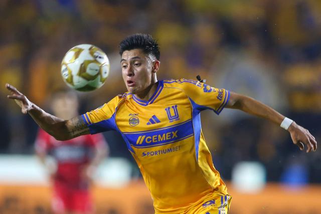 Tigres' US defender #03 Marco Farfan looks at the ball during the Liga MX Apertura quarter-final second leg football match between Tigres and Tijuana at the UANL University Stadium in San Nicolas de los Garza, Nuevo Leon State, Mexico on November 29, 2025. (Photo by Julio Cesar AGUILAR / AFP)