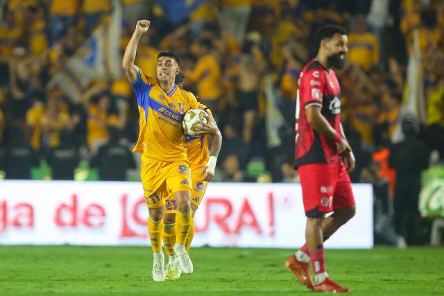 Tigres' Argentine midfielder #11 Juan Brunetta celebrates scoring his team's second goal during the Liga MX Apertura quarter-final second leg football match between Tigres and Tijuana at the UANL University Stadium in San Nicolas de los Garza, Nuevo Leon State, Mexico on November 29, 2025. (Photo by Julio Cesar AGUILAR / AFP)