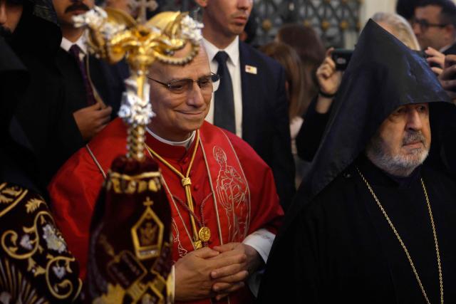 Pope Leo XIV arrives for a visit to the Armenian Apostolic Cathedral, in Istanbul on November 30, 2025. (Photo by BERK OZKAN / AFP)