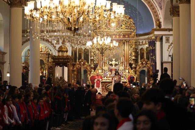 TOPSHOT - Pope Leo XIV stands next to Patriarch Sahak II during a visit to the Armenian Apostolic Cathedral, in Istanbul on November 30, 2025. (Photo by BERK OZKAN / AFP)