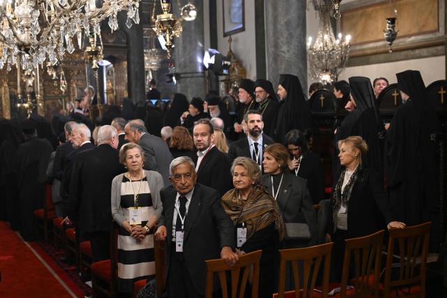 Faithful wait for the arrival of Pope Leo XIV before a Divine Liturgy at Patriarchal Church of Saint George, in Istanbul on November 30, 2025. (Photo by YASIN AKGUL / AFP)