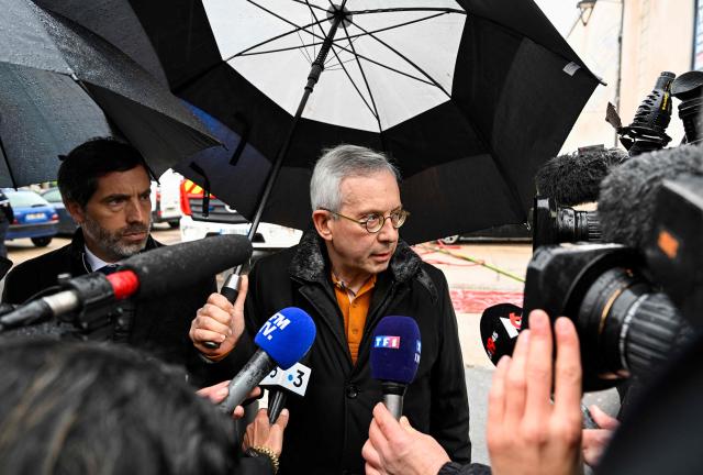 Meurthe-et-Moselle's prefect Yves Seguy speaks to the press following a fire that killed at least five people in Neuves-Maisons, eastern France, on November 30, 2025. A 59-year-old man, a 60-year-old woman, a 20-year-old woman and a 16-year-old boy died, the fire brigade announced. A fifth person, who had been seriously injured, succumbed to their injuries, the prefecture said shortly afterwards. (Photo by Jean-Christophe VERHAEGEN / AFP)